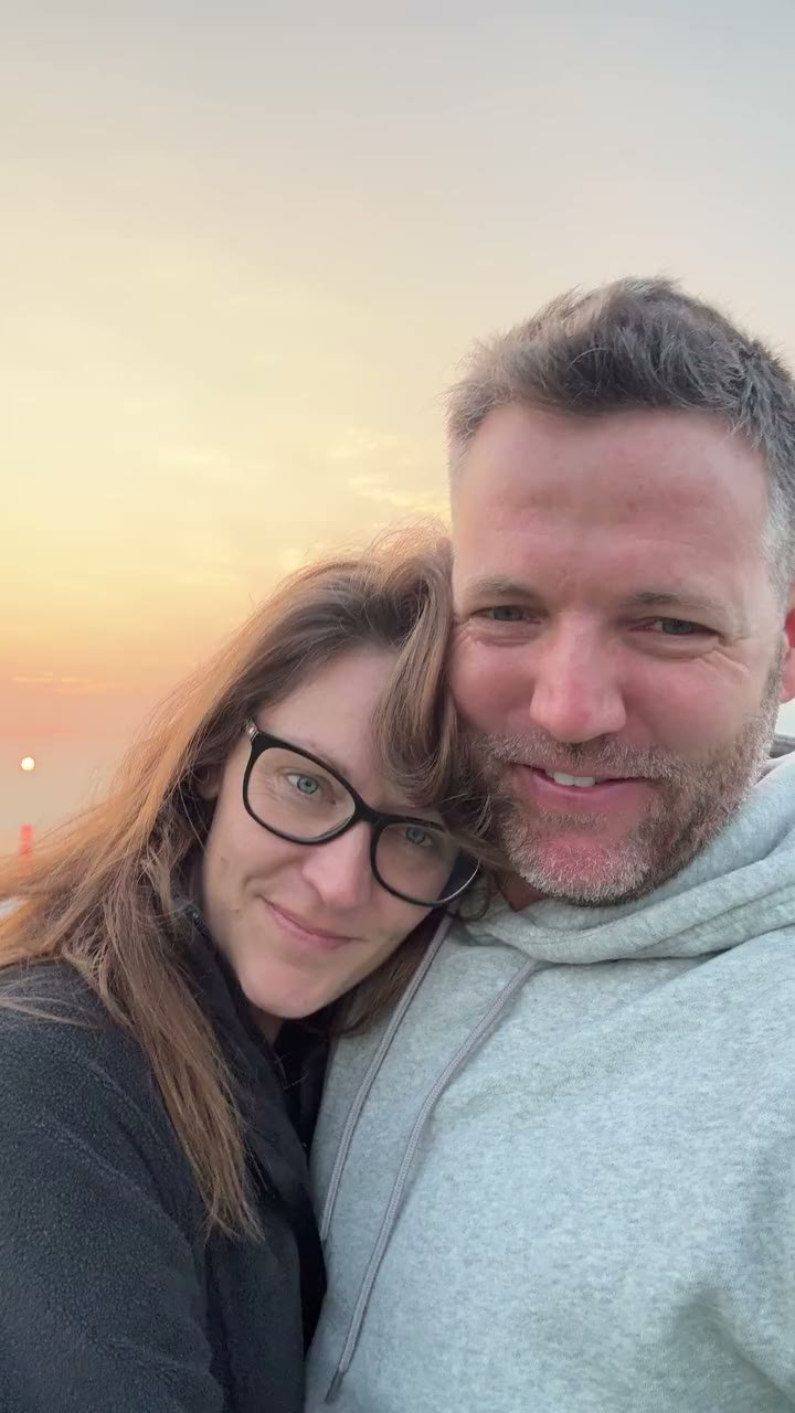 A kiss over the bay at sunset